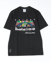 adidas（アディダス）の「adidas アディダス M ARCHIVE AFRICA94 GRAPHIC TEE ショートスリーブ KC7920 ABC-MART限定 *BLACK（Tシャツ/カットソー）」