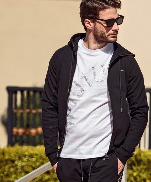 1PIU1UGUALE3  RELAX （ウノピゥウノウグァーレトレ リラックス）の「1PIU1UGUALE3 RELAX(ウノピゥウノウグァーレトレ)ラインストーンロゴ半袖Tシャツ（Tシャツ/カットソー・メンズ・ホワイト/ブラック・S/M/L/XL/XXL）」の5枚目の写真