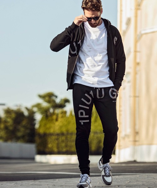 1PIU1UGUALE3  RELAX （ウノピゥウノウグァーレトレ リラックス）の「1PIU1UGUALE3 RELAX(ウノピゥウノウグァーレトレ)ラインストーンロゴ半袖Tシャツ（Tシャツ/カットソー・メンズ・ホワイト/ブラック・S/M/L/XL/XXL）」の4枚目の写真