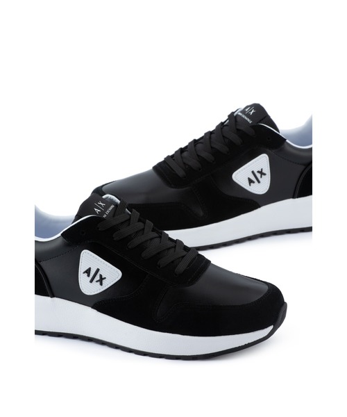 ARMANI EXCHANGE(アルマーニエクスチェンジ)の「【A|X アルマーニ エクスチェンジ】A|Xロゴパッチ レースアップスニーカー(スニーカー・メンズ・ホワイト系その他/ブラック・7.5/7/9/6/10/8/8.5/6.5/5.5/9.5)」の1枚目の写真