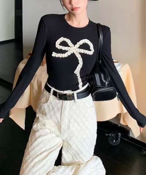 Alvia(アルビア)の「フリルリボンデザイン リブ長袖トップス(Tシャツ/カットソー・レディース・ブラック/アイボリー・M)」の1枚目の写真