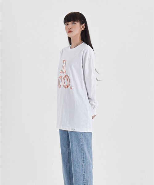 APOSTROPHE COMMA(アポストロフィコンマ)の「ACOロゴ長袖Tシャツ(ホワイト-オレンジ)(Tシャツ/カットソー・レディース・その他・MEDIUM/SMALL/X-LARGE/LARGE)」の1枚目の写真