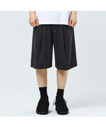 S'EST（エスイーエスティー）の「バミューダワイドフィットワンタックトレーニングショートパンツ - チャコール（その他パンツ）」