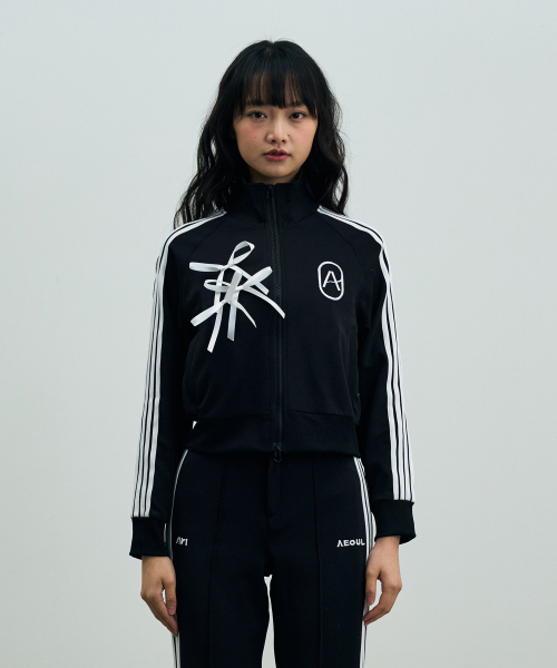 ARI(アリ)の「JOEL JERSEY TRACK TOP / BLACK(ナイロンジャケット・レディース・ブラック・FREE)」の1枚目の写真