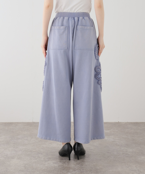 TAAKK(ターク)の「TAAKK SCULPTURAL EMBROIDERY WIDE PANTS TA26SS-PT070:パンツ(スウェットパンツ・レディース・ブルー・X-SMALL)」の9枚目の写真