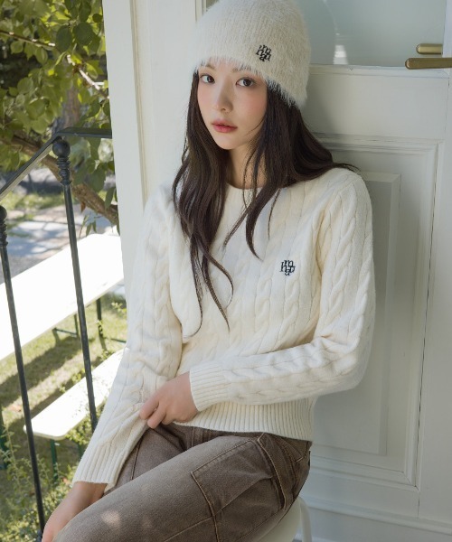 muahmuah(ムーアムーア)の「A'GEM/9 × .kom 『muah muah/ムーアムーア』 TWIST ROUND LOGO KNIT/ツイストラウンド ロゴニット(ニット/セーター・レディース・アイボリー/ブラウン/ネイビー・FREE)」の5枚目の写真