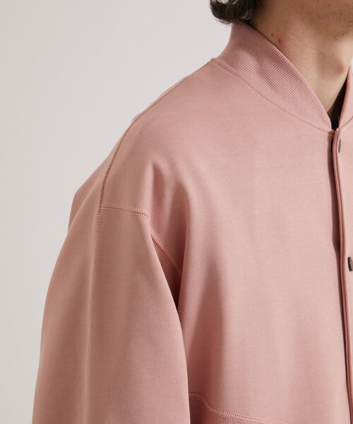 UNITED TOKYO（ユナイテッドトウキョウ）の「リーバススウェット MA-1ジャケット（MA-1・メンズ・オフホワイト/ピンク/ダークグレー・1/2）」の8枚目の写真