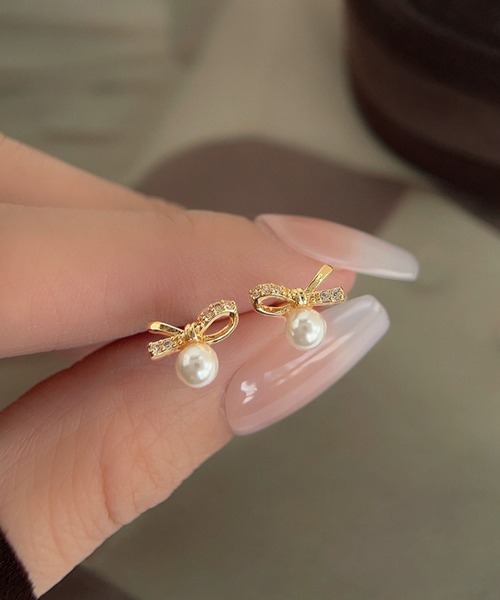 yu-ka(ユーカ)の「YU-KA:リボン&パールデザインピアス ribbon & Pearl design pierce(ピアス(両耳用)・レディース・ゴールド・FREE)」の1枚目の写真