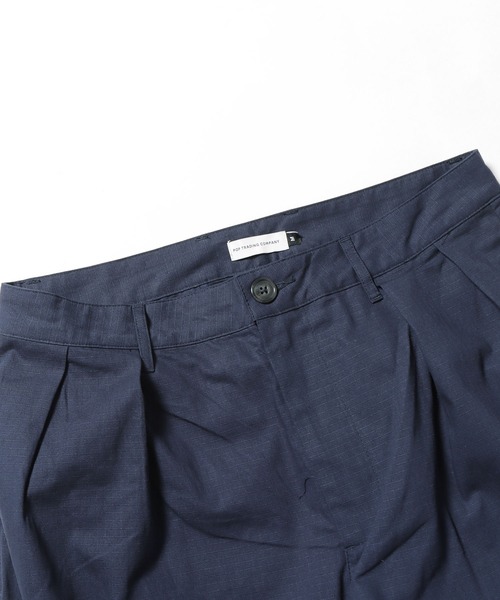 POP TRADING COMPANY(ポップトレーディングカンパニー)の「POP TRADING COMPANY/ポップトレーディングカンパニー HEWITT SUIT PANT テーパードパンツ 刺繍 ブランドロゴ(チノパンツ・メンズ・ネイビー・L/XL/M)」の9枚目の写真