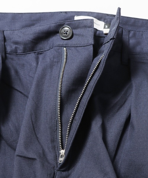 POP TRADING COMPANY(ポップトレーディングカンパニー)の「POP TRADING COMPANY/ポップトレーディングカンパニー HEWITT SUIT PANT テーパードパンツ 刺繍 ブランドロゴ(チノパンツ・メンズ・ネイビー・L/XL/M)」の11枚目の写真