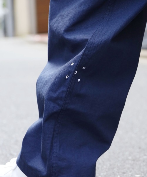 POP TRADING COMPANY(ポップトレーディングカンパニー)の「POP TRADING COMPANY/ポップトレーディングカンパニー HEWITT SUIT PANT テーパードパンツ 刺繍 ブランドロゴ(チノパンツ・メンズ・ネイビー・L/XL/M)」の22枚目の写真