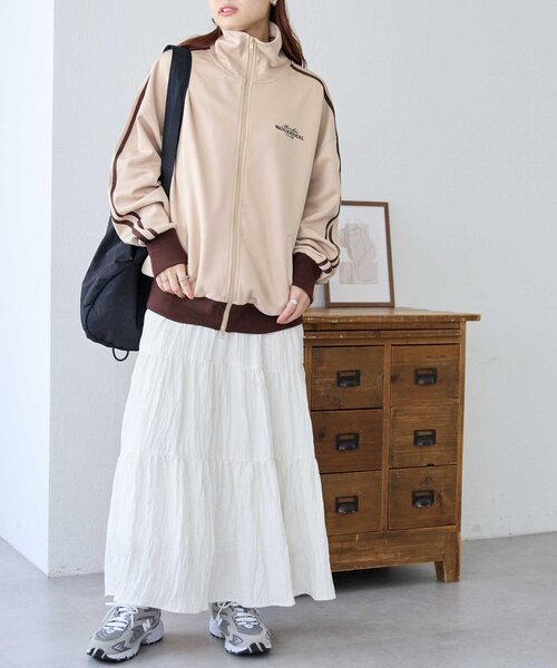 DISCOAT（ディスコート）の「【ユニセックス】ワンポイント刺繍トラックジャケット（パーカー・レディース・ベージュ/ネイビー/ブラウン・FREE）」の8枚目の写真