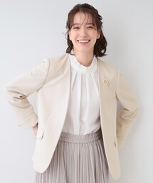 アイボリー ノーカラージャケット フリル付き ABITOKYO ジャケット ノーカラージャケット ダンボールニット