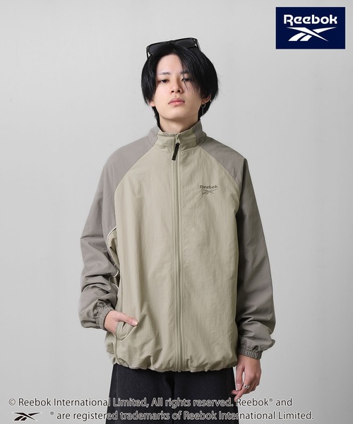 Reebok(リーボック)の「【REEBOK】 ラグラン 袖ライン パイピング ドロスト ナイロンジャケット(ナイロンジャケット・レディース・サックスブルー/グレイッシュベージュ/ブラック・MEDIUM/LARGE/X-LARGE)」の10枚目の写真