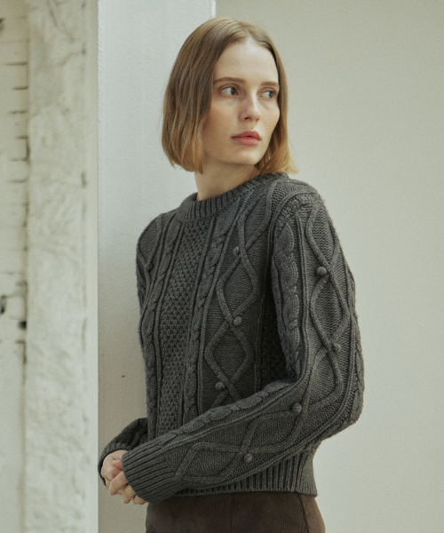 YUPPE(ヨッペ)の「BELL CABLE KNIT_CHARCOAL(ニット/セーター・レディース・その他・FREE)」の1枚目の写真