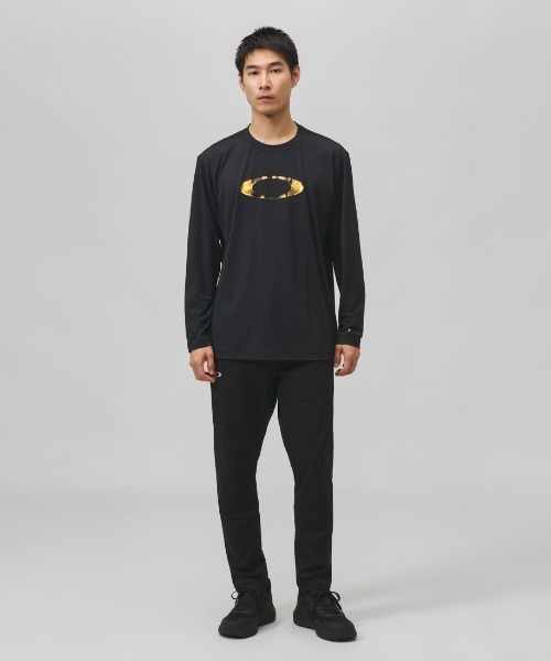 OAKLEY(オークリー)の「オークリー OAKLEY ENHANCE QD LS TEE BOLD EVO 5.7(Tシャツ/カットソー・メンズ・ブラック×ゴールド・M/LL/L/S)」の3枚目の写真