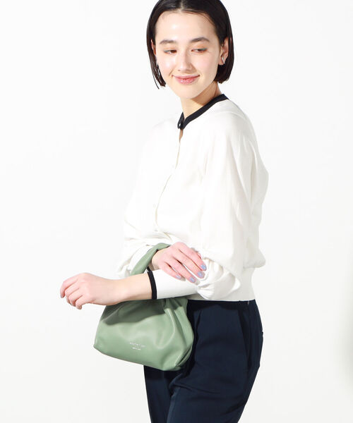 NOLLEY’S（ノーリーズ）の「パール釦クルーネックカーディガン（カーディガン/ボレロ・レディース・ベージュ/ネイビー/サックスブルー/ピンク/ライトグリーン/ホワイト系その他4・38/36）」の11枚目の写真