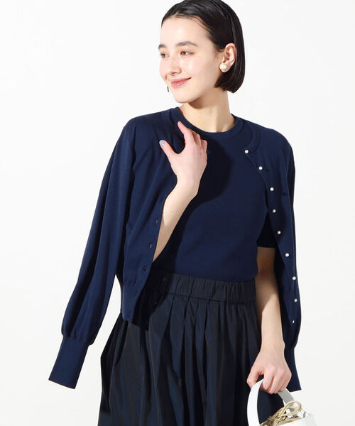 NOLLEY’S（ノーリーズ）の「パール釦クルーネックカーディガン（カーディガン/ボレロ・レディース・ベージュ/ネイビー/サックスブルー/ピンク/ライトグリーン/ホワイト系その他4・38/36）」の16枚目の写真