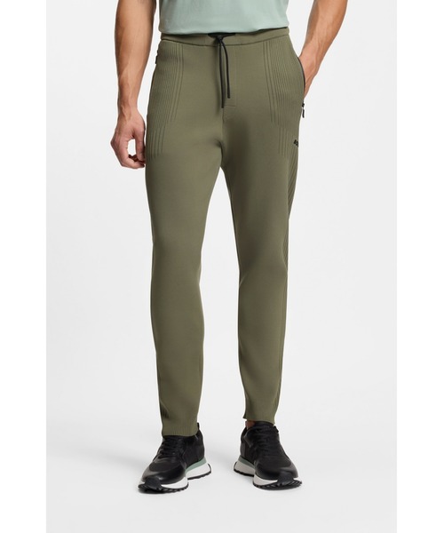 BOSS(ボス)の「レギュラーフィット トラックスーツボトムス ジャカードストライプ(その他パンツ・メンズ・カーキ・S/L/M)」の1枚目の写真