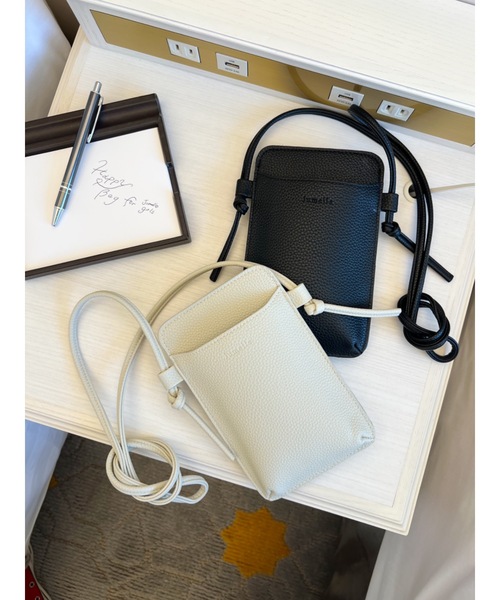 JUMELLE(ジュメロ)の「daily smapho pouch(ボディバッグ/ウエストポーチ・レディース・アイボリー/ブラック・FREE)」の10枚目の写真