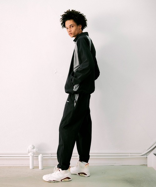 NOISE MAKER(ノイズメーカー)の「ナイロントラックパンツ【MADE IN JAPAN】(その他パンツ・メンズ・ブラック×グレー・L)」の2枚目の写真