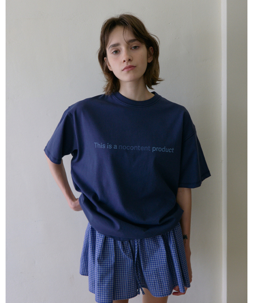 NOCONTENT(ノーコンテント)の「154. ノコンテンツプロダクトT _ ネイビー(Tシャツ/カットソー・レディース・その他・FREE)」の1枚目の写真