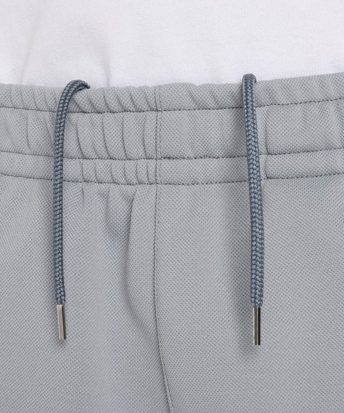 NEW BALANCE（ニューバランス）の「NB GREY ヴィンテージジョガーパンツ（スウェットパンツ・メンズ・ライトグレー/ネイビー・MEDIUM/LARGE/X-LARGE/SMALL/XX-LARGE）」の5枚目の写真