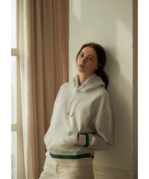 JUNECI（ジュネシ）の「シグネチャーフードパーカー - カラーリンググリーン（パーカー）」