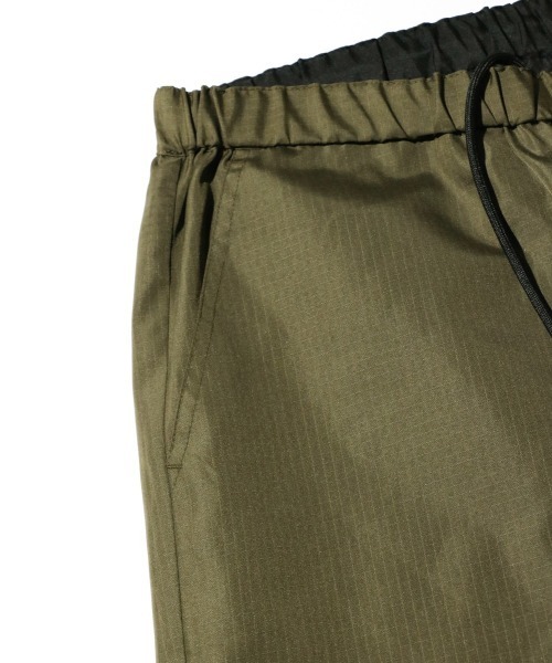 TAION(タイオン)の「TAION / タイオン NON DOWN MILITARY REVERSIBLE WIDE PANTS (TAION-R139NDML-1) ミリタリー ワイド バギーパンツ(その他パンツ・メンズ・ブラック/オリーブ/その他1/ダークネイビー・MEDIUM/LARGE/X-LARGE)」の7枚目の写真