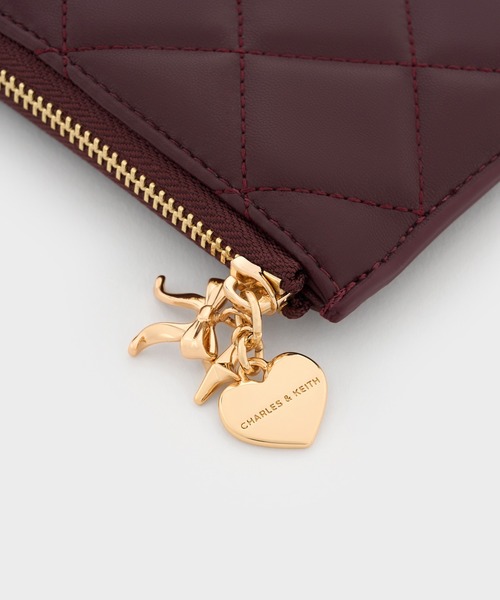 CHARLES & KEITH(チャールズ & キース)の「Arrietty アリエッティ キルトボウハートチャーム ジップアラウンドウォレット(カードケース・レディース・ライトピンク/ブラック/ワインレッド・XXS)」の6枚目の写真