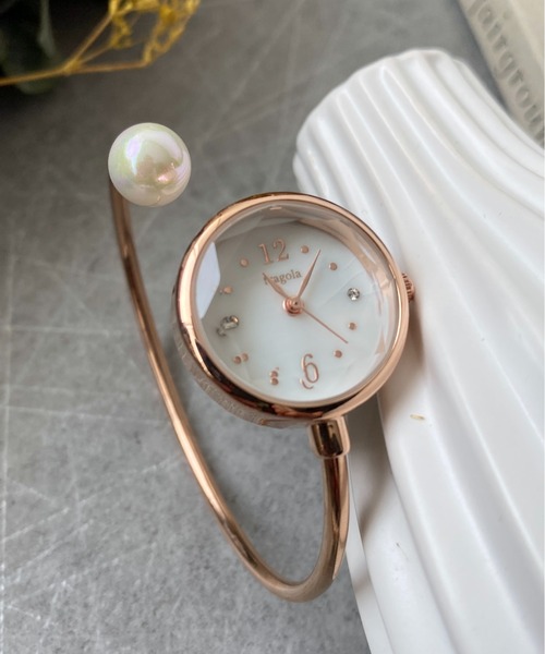 Three Four Time（ｽﾘｰﾌｫｰﾀｲﾑ）の「ツイストバングルウォッチ　/　時計（アナログ腕時計・レディース・シルバー/ピンクゴールド・FREE）」の2枚目の写真