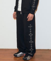 MAHAGRID（マハグリッド）の「mahagrid 『mahagrid/マハグリッド』 Cross Stud Sweatpants/クロススタッズスウェットパンツ（スウェットパンツ）」