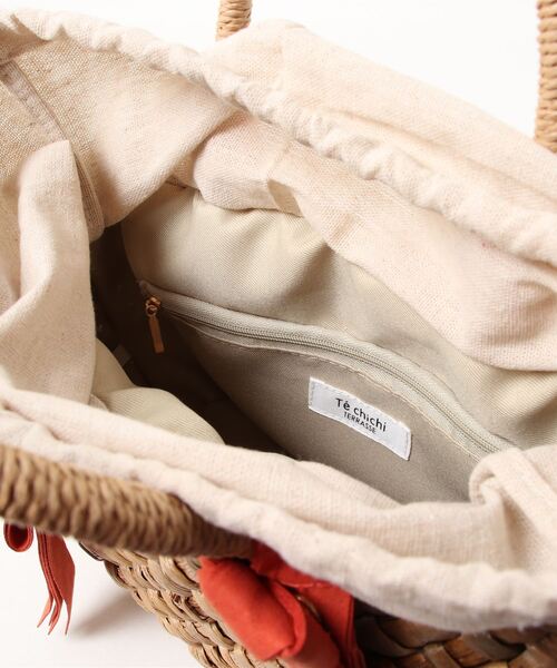 Lugnoncure（ルノンキュール）の「リボンフリンジ付ミニかごトート（トートバッグ・レディース・オレンジ/キャメル/グリーン・ﾌﾘ-）」の4枚目の写真