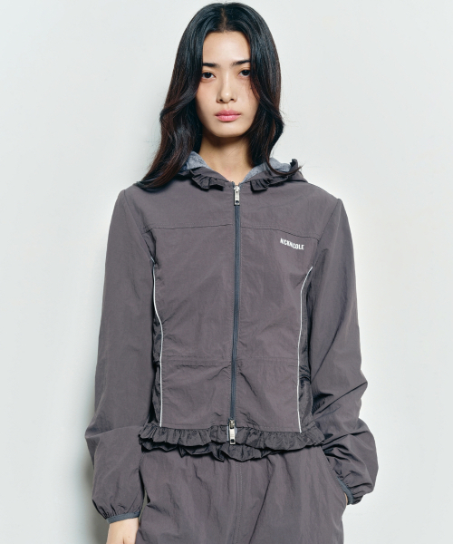 NICK&NICOLE(ニックアンドニコール)の「RUFFLE LACE HOOD JACKET_CHARCOAL(ナイロンジャケット・レディース・チャコール・FREE)」の1枚目の写真