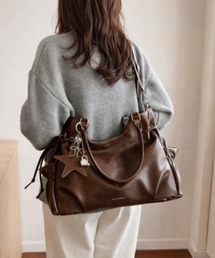 pyornim（ピョルニム）の「【26年春夏新作】【2WAY】【2点セット】【A4サイズ対応】フェイクレザースターチャーム付きショルダーボストンバッグ（トートバッグ）」