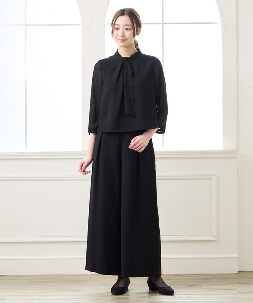 AIMER(エメ)の「【夏用喪服・礼服】マシンウォッシャブル ボウタイブラウス・タックワイドストレートパンツ セットアップサマーブラックフォーマル(スーツパンツ・レディース・ブラック・LARGE/MEDIUM)」の2枚目の写真