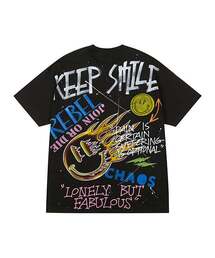 THE MADNESS（ザ マッドネス）の「HAND WORK KEEP SMILE T-SHIRTS_BK（Tシャツ/カットソー）」