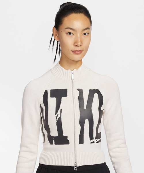 NIKE(ナイキ)の「NIKE AS W NSW STREET GRAPHIC FZ SWEATER / ナイキ ウィメンズ ストリート グラフィック フルジップ セーター【SP】(ニット/セーター・レディース・アイボリー・L/M/S)」の1枚目の写真