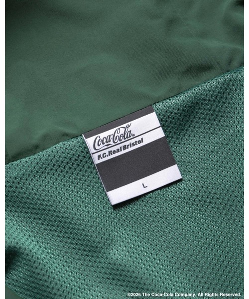 F.C.Real Bristol(エフシーレアルブリストル)の「Coca-Cola BIG LOGO WARM-UP JACKET(ナイロンジャケット・メンズ・グリーン/ネイビー/ブラック・X-LARGE/LARGE/MEDIUM/SMALL/XX-LARGE)」の9枚目の写真
