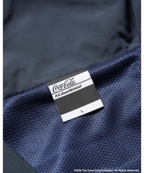 F.C.Real Bristol(エフシーレアルブリストル)の「Coca-Cola BIG LOGO WARM-UP JACKET(ナイロンジャケット・メンズ・グリーン/ネイビー/ブラック・X-LARGE/LARGE/MEDIUM/SMALL/XX-LARGE)」の22枚目の写真