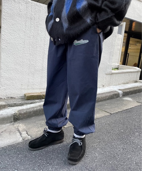 WHO'S WHO gallery(フーズフーギャラリー)の「【KOOKY'N/クーキー】スタジアムウォームアップパンツ(その他パンツ・メンズ・ブラック/ネイビー/ブラウン/ダークネイビー/グリーン系その他/ブルー系その他/ブラック系その他・FREE)」の1枚目の写真