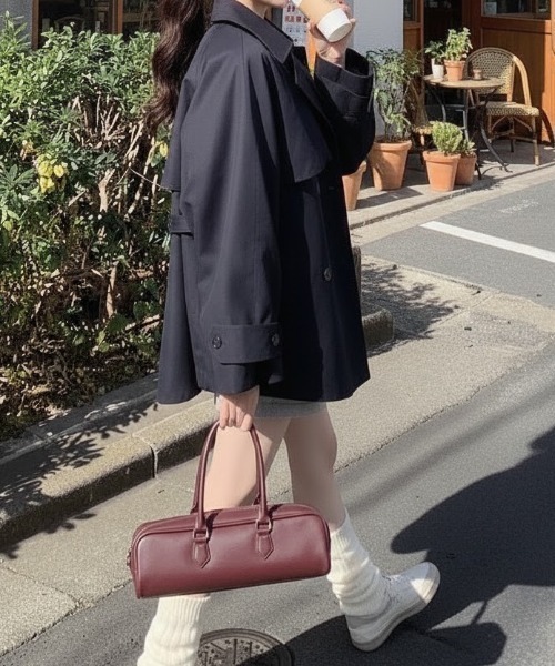 cammie(キャミー)の「トレンチ風ミドル丈コート(トレンチコート・レディース・アイボリー/ブラック・M/L)」の9枚目の写真