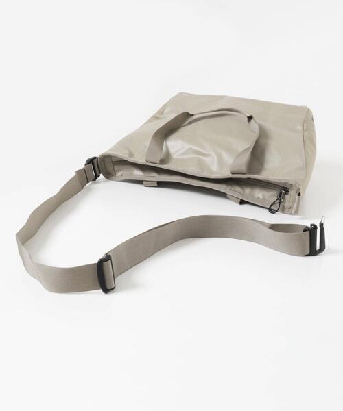 SALOMON(サロモン)の「SALOMON EXTENDED TOTEBAG SMALL(トートバッグ・メンズ・ベージュ・FREE)」の5枚目の写真