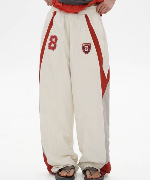 MASONPRINCE(メイソンプリンス)の「ルーズフィット エンブレムロゴ刺繍 トラックパンツ XXK4331【MASONPRINCE】(その他パンツ・メンズ・ネイビー/ホワイト・M/L/S/XL)」の1枚目の写真