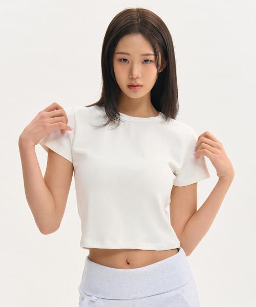 NINEZ(ナインゼット)の「シグネチャースリムクロップ半袖Tシャツ (2カラー)(Tシャツ/カットソー・レディース・ブラック/ホワイト・SMALL/MEDIUM)」の5枚目の写真