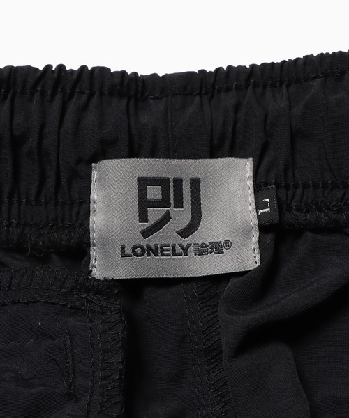 LONELY/論理（ロンリー）の「LONELY(論理)/ロンリー STOCK LOGO” NYLON WARM UP PANTS ナイロンパンツ（その他パンツ・メンズ・ブラック・XL/L/M）」の4枚目の写真