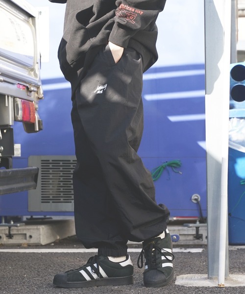 LONELY/論理（ロンリー）の「LONELY(論理)/ロンリー STOCK LOGO” NYLON WARM UP PANTS ナイロンパンツ（その他パンツ・メンズ・ブラック・XL/L/M）」の13枚目の写真