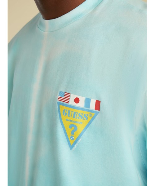 Guess(ゲス)の「GUESS Originals SU GAMES Tie Dye Triangle Logo Tee(Tシャツ/カットソー・メンズ・オレンジ/ブルー・SMALL/MEDIUM/LARGE/X-LARGE)」の11枚目の写真