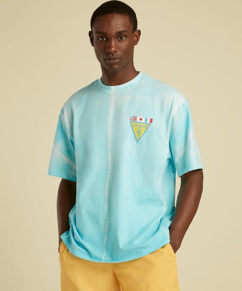 Guess(ゲス)の「GUESS Originals SU GAMES Tie Dye Triangle Logo Tee(Tシャツ/カットソー・メンズ・オレンジ/ブルー・SMALL/MEDIUM/LARGE/X-LARGE)」の14枚目の写真