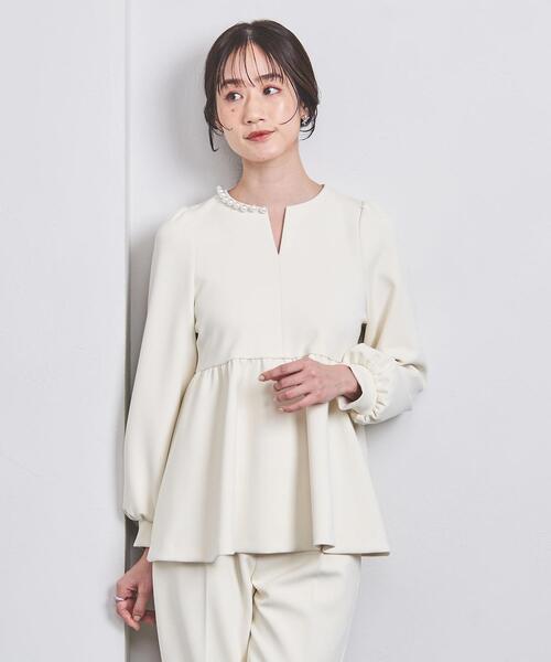 ユナイテッドアローズ　パールモチーフペプラムブラウス UNITED ARROWS（ユナイテッドアローズ）の「SPONGY パールモチーフ